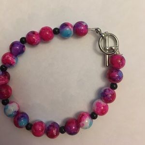 This bracelet is made of string